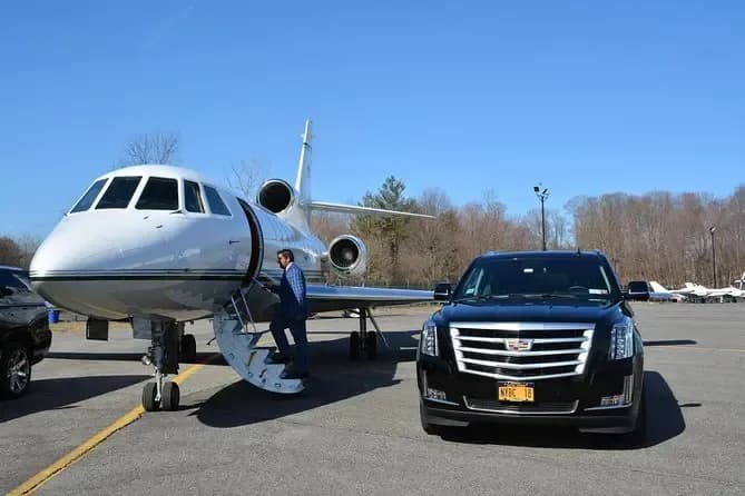 Black luxury car service at JFK airport terminal New York City